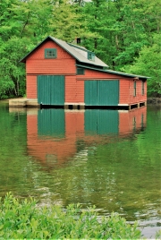 Squam Lake boathouse reflection